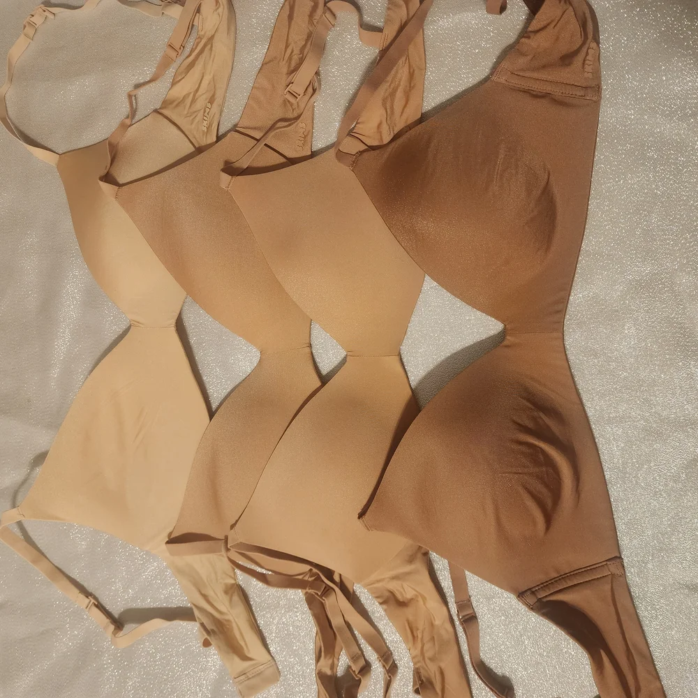 SKIMS. T-SHIRT DEMI BRA Neutral Tone Bras - Picture 2 of 8